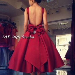 Sexy Backless Prom Dresses Satin Evening Gowns Scoop Sleeveless Tea Length Big Bow Party Dress Dark Red,Royal Blue,Champagne Ball Gown