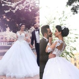 Gorgeous Ball Gown Arabic Wedding Dress Illusion Bodice Sheer Long Sleeves Puffy Tulle Bridal Gowns with Lace Appliques See Through Back