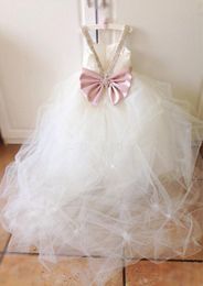 2016 Flower Girls Dresses For Weddings Beaded Spaghetti Pleated Tulle Cute Pink Bow First Communion Dresses Pageant Dresses For Girls