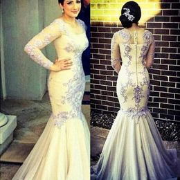 African Long Sleeves Prom Dresses Silver Lace Appliques Sheer Neck Evening Gowns Back Covered Buttons Mermaid Formal Party Dress Sweep Train