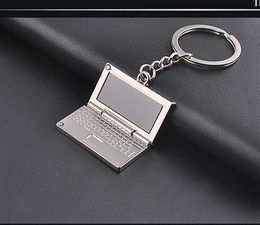 10pcs/lot free shipping woman man mini lovely laptop keychain Model unisex fashion key ring