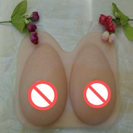 Free shipping factory direct selling sexy beautiful silicone fake breasts false boobs for crossdresser whole sale one-piece style