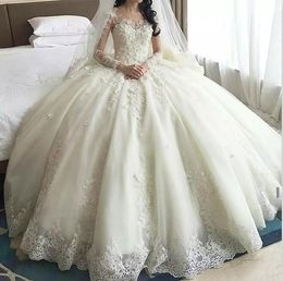 Luxury 2017 Lace And Tulle Ball Gown Wedding Dresses Modest Sheer Neck Illusion Long Sleeves Appliqued Beads Cathedral Bridal Gowns EN7149