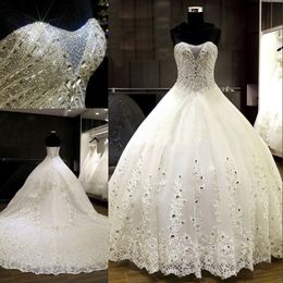 Luxury Wedding Dresses Ball Gown Wedding Dresses Strapless Sleeveless Bling Crystals Lace Appliques Sequins Tulle Puffy Bridal Gowns
