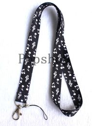 The pictorial design of a note Lanyard Keychain Key Chain ID Badge cell phone holder Neck Strap.