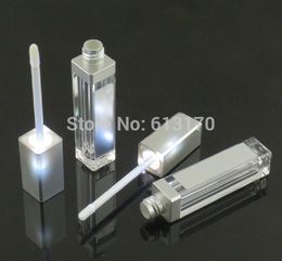 Free shipping 8ml lip gloss tubes with black,silver cap and LED light DIY Empty mascara cream tube,revitalash bottle