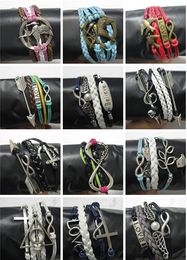 random 50 Styles Mix Order Infinite Believe Hunger Games Anchor Love Jesus Owl Birds Multilayer Pattern Leather Bracelet 50pcs