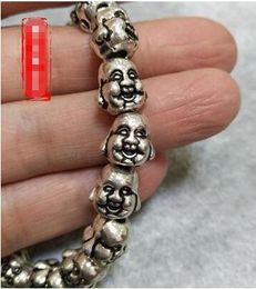 Miao silver bracelet double-sided Buddha head smooth beads Maitreya Buddha