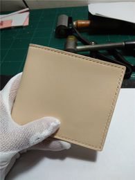 Wholesale Original vegetable tanning cowhide genuine leather handmade engraving mens Wallet Classic BI FOLD is shown, Father's day gift