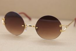 Selling Male and female UV400 Protection Metal Round Sunglasses 2804392 Rimless High quality fashion vintage Women Glasses 18k Gold C Decoration Unisex