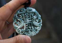 Natural ginger flower jade, double dragon sends blessing (amulets). Necklace pendant.