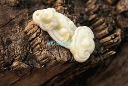 Handmade carving of natural white (lam tin) jade. The mythical wild animal. Ruyi, amulet necklace pendant.