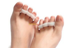 200pcs(=100Pairs) Free Shipping 3 holes Silicone Gel toe separator Toe Finger Separator feet care tools Bunion Guard Foot Hallux Valgus