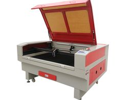 1490 100W CO2 laser cut machine.T-blade table used for ABS , acrylic ,cloth ,leather and other non-metallic materials