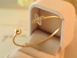 Fashion Jewelry Crystal Clover Women Gold Plated Cuff Bracelet Jewelry Open flower & Ball Bangle classic Type Crystal Rhinestones