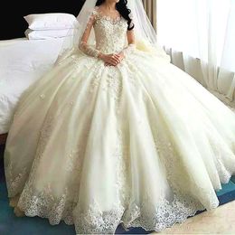 Romantic Dubai Arabic Wedding Gowns Sheer Jewel Neck Lace-Applique Long Sleeves Bridal Gowns 2017 Glamorous Cathedral Train Wedding Dresses