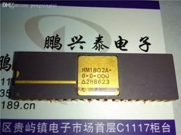 HM1802A-0-D-000 , HM1802A . Gold surface dual in-line 40 pin dip Ceramic package . 1802 Vintage 8-BIT microprocessor CPU. CDIP40 integrated