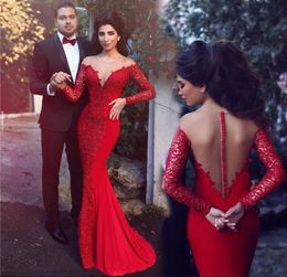 2021 Charming Red Long Sleeve Evening Dresses With Lace Sheer Neckline Sheath Designer Cheap prom Formal Dresses Gowns Applique Re4366057