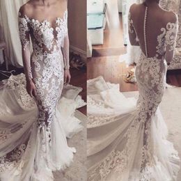 Lace Sheer Back Covered Buttons Mermaid Wedding Dresses 2017 See Through Long Sleeves Bridal Gowns Court Train Wedding Vestidos