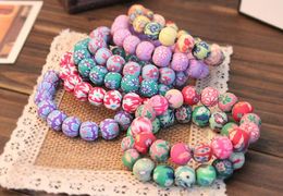 Kids 10mm*18 Beaded Bracelet Fashion Printed polymer clay bracelets 20pcs Bohemian beaded bracelets Elastic force Clay Bracelets