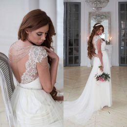 Sexy Backless Beach Wedding Dresses Sheer Bateau Neck Capped Sleeves Beading Crystals Lace Appliques Tulle Bohemian Bridal Gown LS 31-8