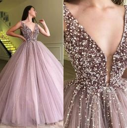 Charming Blush Pink Ball Gown Prom Dresses Deep V Neck Sequined and Pearl Tulle Pageant Gown Floor Length Prom Skirt