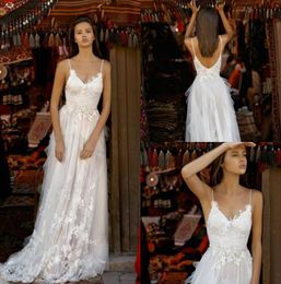 liz martinez wedding dresses spaghetti lace boho bridal gowns with appliques sweep train backless beach wedding dress custom made