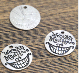 15pcs we are all quite mad here you/'ll fit right in Silver tone charm 20mm