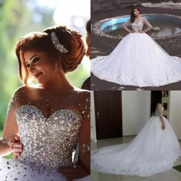 Luxury Sheer Long Sleeve Arabic Wedding Dress Crystals Beaded Pearls Princess Puffy Tulle Ball Gown Wedding Gowns with Lace Appliques Plus Size Women Bridal Gowns