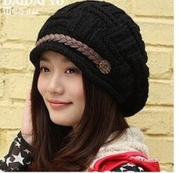 Korean version of the thermal protection ear Knitted Wool Hat Lady winter fashion curling side hat L825