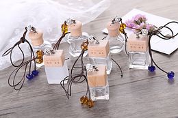 New Type Empty Hanging Car Refillable Diffuser Perfume Glass Bottles Essential Oil Perfume Bottle With Wood Beautiful Cap