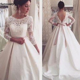 Charming Plus Size Arabic Nigerian Wedding Dresses Beading Belt Cap Sleeve Stain Ruffles Backless Bridal Gowns