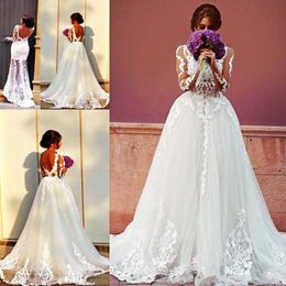 Long Sleeve Arabic Overskirts Dresses Backless Sheer Neck Appliqued Lace Wedding Dress Sexy See Through Mermaid Bridal Gowns