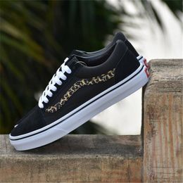 black and leopard print vans