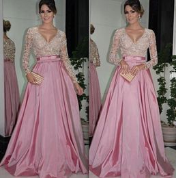 Sexy See Through Pink Evening Dresses Top Major Beaded Illusion Long Sleeves Deep V Neck Formal Party Gowns Floor Length A-Line Prom Dresses