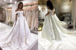 Modest Off the shoulder Wedding Dresses A line Applique Lace Sequin Beaded With Short Sleeve V Neck Backless Chapel Train New Cheap