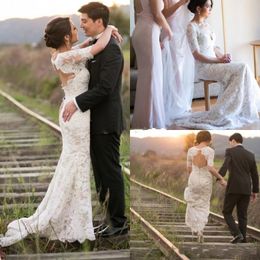 2018 Vintage Lace Mermaid Wedding Dresses Half Sleeve V-Neck Covered Button Bare Back Court Train Boho Bridal Gowns Country Wedding Gowns