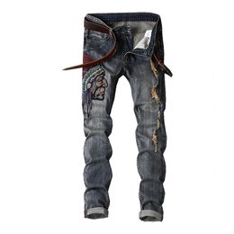 Europe and America jeans man explosion models mens slim ripped washed hole embroidery Indian plus size