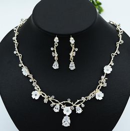 Bridal two sets of wedding dresses, flowers, accessories, handcrafted necklace, earrings, alloy jewelry.