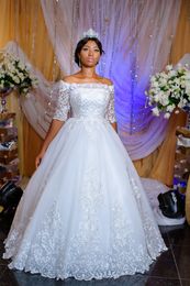 Árabe Nigerian Wedding Vestidos Sheer Decote Long Illusion Mangas Backless Sweep Train Train Lace Applique Wedding Brown Vestidos Personalizados