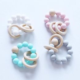 50pcs Baby Teether Rings Food Grade Silicone and Beech Wood Teething Ring Bracelet Silicone Teethers Chew Toys Shower Gifts BPA FREE YE019