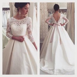 2018 Charming Long Sleeve Wedding Dresses Open Back Sheer Bateau Neck Buttons Beaded Belt Chapel Train Satin Plus Size Bridal Wedding Gowns