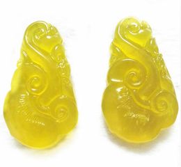 -Glace naturelle de Xiuyan jade Sculpture simple face Ruyi pendentif Xiu jade jaune Ruyi agate pendentif en jade