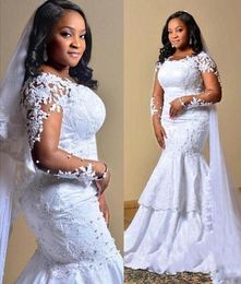 African Mermaid Wedding Dresses Lace Appliques Sweep Train Sexy BackJewel Neck Plus Size Bridal Gowns Pearls Long Sleeve Wedding Dress