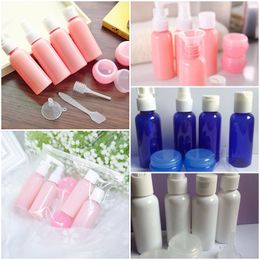 Hot 9PCS/Set Mini Makeup Refillable Travel Bottles Set Plastic Pressing Spray Bottle Makeup Tools Kit Face Cream Pot Bottles