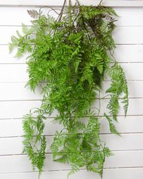 Grünes künstliches Farn-Plastik blüht Kiefern-Farn-Blatt-Hauptweihnachtshochzeiten Hintergrund-Wand-dekorative Wand-hängende Blumen