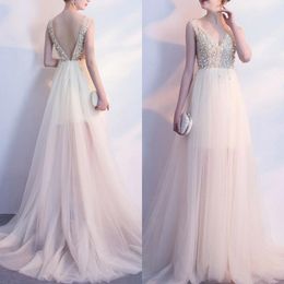 2019 Sparkly A-line Wedding Dresses Deep V Neck Sleeveless Backless Sexy Sheer Tulle Bridal Gowns with Sequins Pearls Top Sweep Train