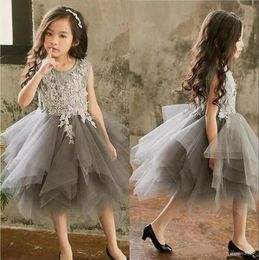 2020 Asymmetrical Flower Girls' Dresses for Weddings with Appliques Kids Formal Wear Jewel Tulle Short Princess Party Gowns