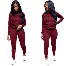 Designer da donna 2 pezzi Abiti tinta unita Fori Pantaloni strappati Felpe con cappuccio 2 pezzi Completi di abbigliamento Tute