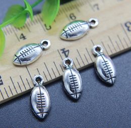 100pcs Mini Rugby Football Alloy Charms Pendant Retro Jewelry Making DIY Keychain Ancient Silver Pendant For Bracelet Earrings 15*7mm